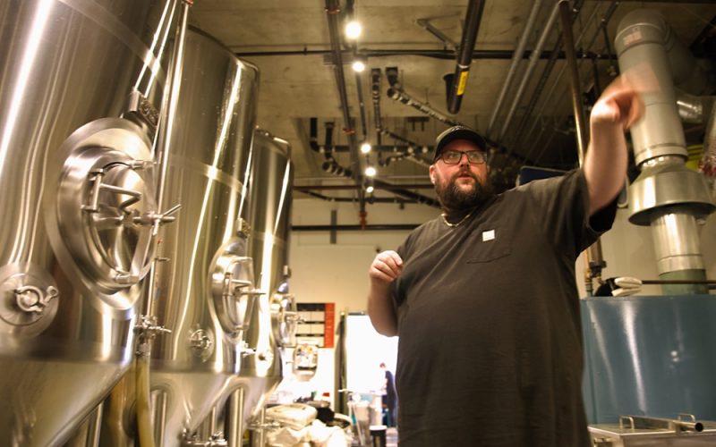 Small Gods co-owner Christopher Bjerrisgaard gives a tour of the brewery behind their Sidney, BC, taproom, capable of fermenting up to 210,000 liters of beer annually. Photo for The Tyee by Katie Hyslop.