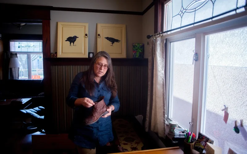 Tasha Nathanson with one of her fish leather boots. ‘Artisanal is wonderful because each time you make your product it’s a bit different. Commercial is the opposite — it needs to be of consistent quality, the same every time.’ Photo by Kathleen Hinkel.