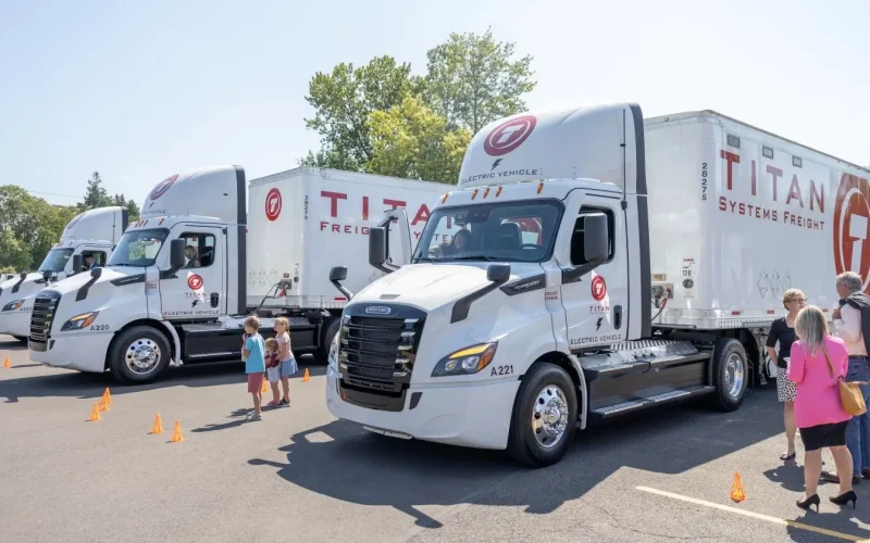 Visitors mingle with Titan’s fleet of electric Class 8 freight haulers at the company’s Portland headquarters. Electrification is advancing fastest in passenger cars, but far heavier trucks contribute a lot more greenhouse gas emissions and local air pollution, vehicle for vehicle. The dirtiest are semis, buses and garbage trucks. Photo supplied.