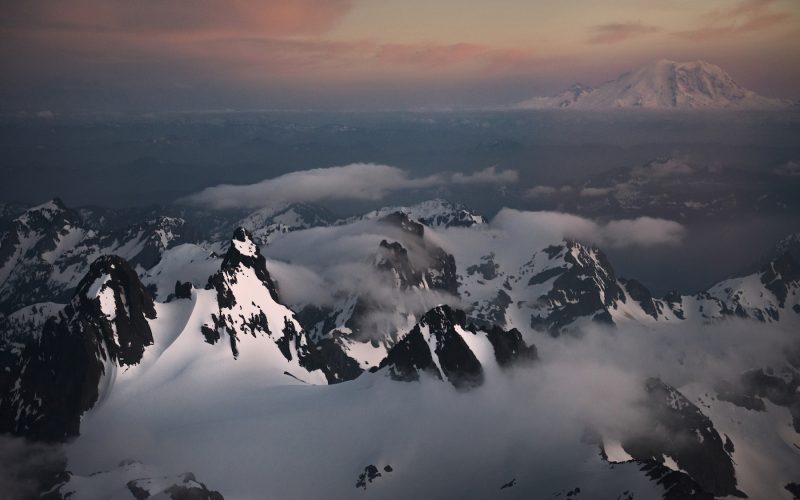 Aerial view of the Cascade Range, in Washington State, including views of Mt Stuart and Mt Rainier.