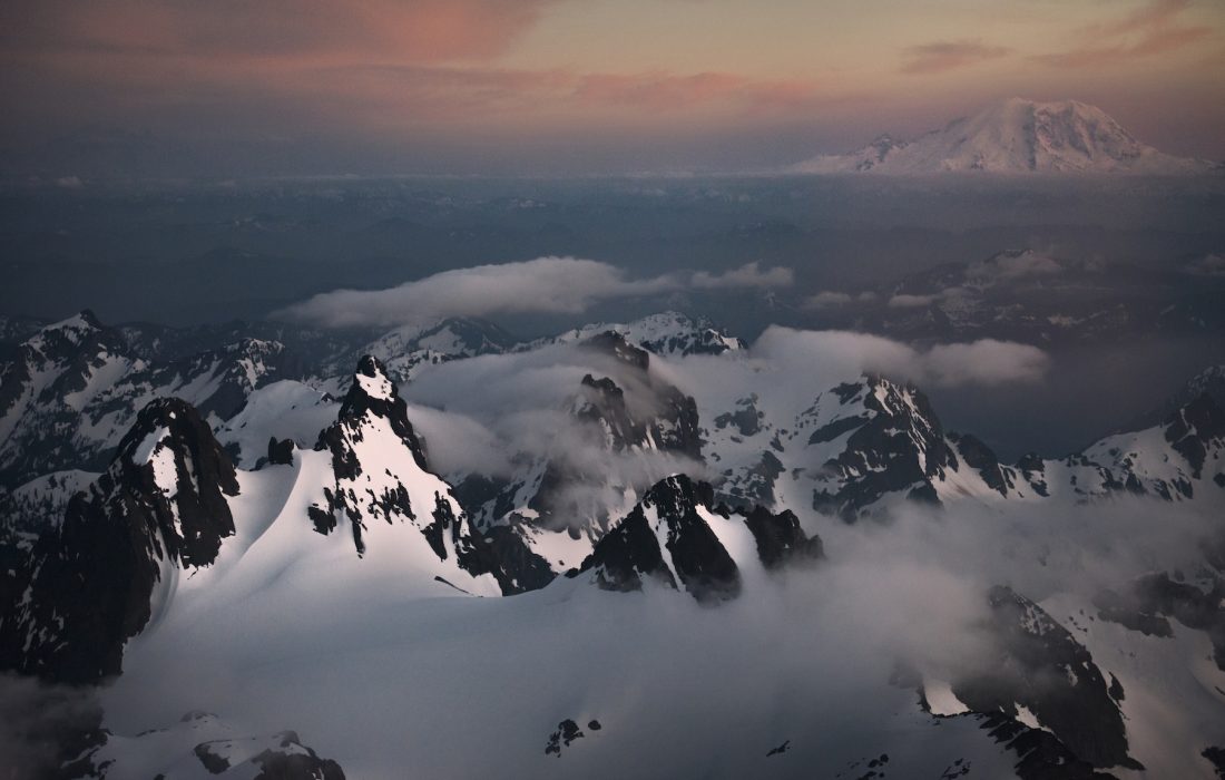 Aerial view of the Cascade Range, in Washington State, including views of Mt Stuart and Mt Rainier.