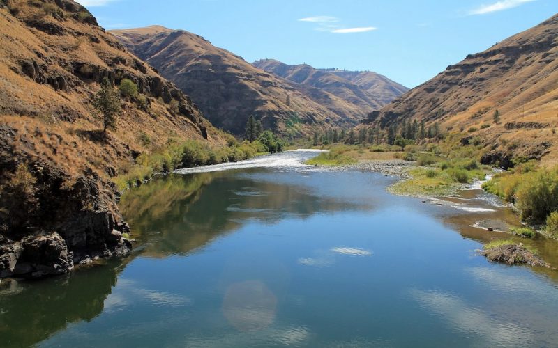 Grande Ronde River Meandering Through Rocky Hillsides and Cottonwood Trees, eastern Oregon, USA